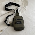 Olive green minimalist nylon chest bag with adjustable black strap on white background - Green