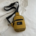 Stylish yellow nylon crossbody chest bag with adjustable black strap and multi-pocket design - Yellow
