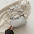 Chic silver glitter underarm bag with twisted handle and pearl chain detail - Silver