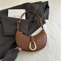 Elegant brown woven crescent hobo bag featuring knotted strap and gold buckle - Brown