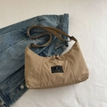 Minimalist khaki nylon crescent crossbody bag with adjustable strap and logo detail - Khaki