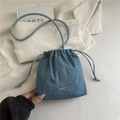 Minimalist blue denim drawstring bucket bag with thin shoulder strap and JINGPIN logo - Blue