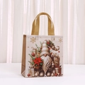 Golden Christmas non-woven gift bag with gnome print and festive snowflake patterns - Gnome with Floral Style (5043-2)
