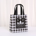 Close-up of Christmas non-woven gift bag with black and white gingham and tree design - 9050-5; 20*9*9; Brand New Non-woven Fabric