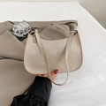 Sparkling champagne gold hobo bag with a metallic finish and glossy glitter texture - Champagne