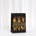 Detail von schwarzer Weihnachtsgeschenktüte mit Goldfolien-Rentier und Schneeflocken - Rentier Wald (051-6) / H21*L15*B8CM