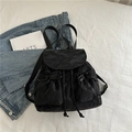 Fashionable black pleated bow backpack for women with shiny fabric and drawstring closure - Black