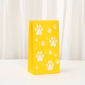 Detail of yellow kraft paper gift bag with white paw prints and side gusset design - Yellow (850-2)