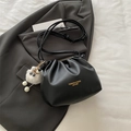 Black pleated bucket bag with adjustable strap and cute sheep pendant detail - Black (With Charm)