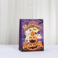 Purple Halloween paper gift bag with pumpkin and ghost prints on a white display - Pumpkin Bat Style (553-2)