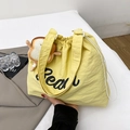 Bright yellow lightweight nylon tote bag with drawstring closure and bread charm - Yellow with Pendant