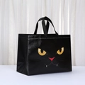 Halloween black non-woven shopping bag featuring a cute cartoon cat face with yellow eyes - Black Cat (8007-2) / 33*25*17cm