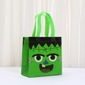 Close-up of green Halloween non-woven gift bag with Frankenstein cartoon face print - Green Frankenstein (9047-2) / 20*20*9cm