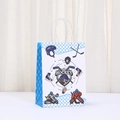 Detail view of hockey themed paper gift bag with sport illustrations and blue grid patterns - Goalie Pattern (554-4)