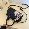Black litchi pattern bucket handbag with cute cartoon monkey charm and woven rope - Black With Pendant