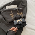 Chic black mini square crossbody bag with gold hardware and chain strap - Black