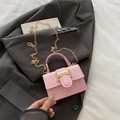 Mini sac bandoulière en cuir rose avec boucle H dorée et bandoulière chaîne femme - Rose Clair