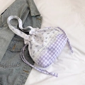 Purple plaid drawstring bucket bag with floral patterns and white lace trim detail - Purple