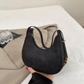 Chic black crescent underarm bag with shimmering glitter finish and golden hardware - Black