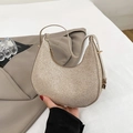 Minimalist beige woven hobo bag for women with a sleek metallic texture finish - Gold