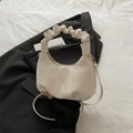 Creamy white pleated cloud handbag with versatile shoulder strap in a minimalist style - Off White