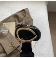 Detail of black leather clutch bag with oversized gold ring handle and chain strap - Black