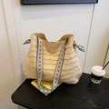 Chic beige fringe crossbody bag with geometric woven strap and decorative side knots - Khaki