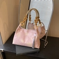Borsa tote floreale rosa con manici di perline e nappa grigia nella variante - Rosa