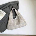 Chic pleated half-moon tote bag in matte cement grey with stylish vertical stitching - Light Gray