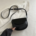 Classic black saddle bag in smooth glossy leather with adjustable golden metal buckle - Black