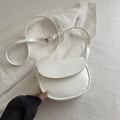 Minimalist white leather saddle bag with gold metal buckle and adjustable shoulder strap - White