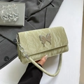 Chic cream green shoulder bag with silver butterfly charm and chain strap detail - Green