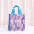Vibrant iridescent shell print non-woven gift bag with blue handles for party favors - Iridescent Fluid Wave Style (5036-3)