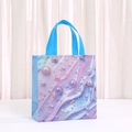 Close-up of shell pattern gift bag with blue handles and gradient bubble prints - Blue Purple Gradient Bubble Wave Style (5036-1)