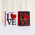Black and white kraft paper gift bags with red LOVE heart and braided handles - Black And White Mixed Style (k7009) / 23*18*10