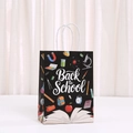 Dettaglio borsa regalo nera Back to School con illustrazioni scolastiche e manici bianchi - Motivo Attrezzatura da Laboratorio (536-6)