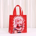 Red Christmas non-woven gift bag with cute Santa Claus print and sturdy handles - Santa with Candy Cane Style (5040-3) / 23x22x11cm