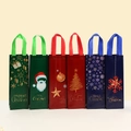 Seis bolsas de regalo para vino de Navidad en tela no tejida con estampados festivos - Patrones navideños surtidos / Multicolor