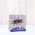 Silver non-woven gift bag with comic POW! design and city silhouette for parties - Silver POW Style (9042-4) / 20x20x9cm