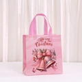 Pink non-woven Christmas gift bag with Merry Christmas print and festive illustrations - Snow Church Christmas Bell Style (5034-3)