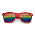 Red plastic sunglasses featuring colorful rainbow pinhole lenses for parties - Rainbow