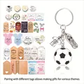 Detail of soccer keychain kit with metallic charms and various themed gift tags - Assorted Tag Styles