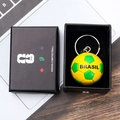 Detail of a Brazil-themed football keychain in a black gift box with a FIFA logo - Style I Soccer Ball Keychain With Gift Box