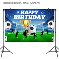 Close-up of a blue soccer birthday backdrop banner with trophy and player silhouettes - Theme Backdrop