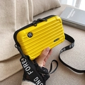 Mini luggage style hard shell crossbody bag in bright yellow with lettered strap - Yellow
