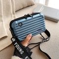 Metallic blue hard shell crossbody mini trunk bag with Forever Young strap - Ice Blue