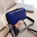 Dark blue hardshell mini crossbody bag with travel suitcase texture and branded strap - Sapphire Blue