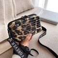 Mini leopard print hard shell crossbody bag with Forever Young branded woven strap - Black Leopard
