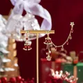 Christmas bow and star stud earrings in red and gold finish with festive charms - Asymmetrical Bell & Snowflake Style Ear Cuff (Stud 0034)