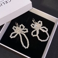 Elegant silver butterfly tassel earrings with white pearls and sparkling zircons - Pearl Woven Bowknot (E4991-1)